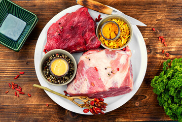 Pieces of raw meat for cooking, flat lay.