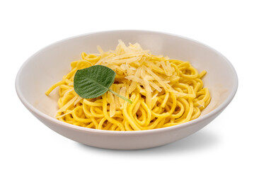 Tagliolini spaghetti egg pasta with butter and sage sauce with parmesan flakes in white dish isolated