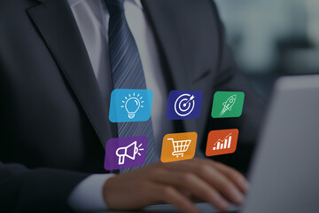Fototapeta premium Business icons representing strategy marketing and growth overlayed on a person using a laptop