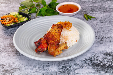 Spicy roasted chicken wing with rice