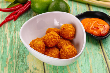 Fried crispy yellow cheese balls