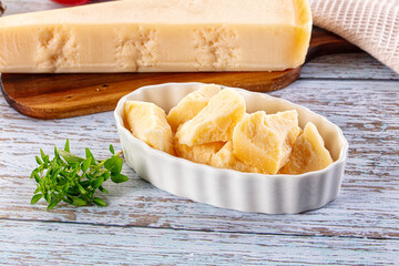 Parmesan cheese pieces in the bowl