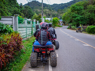 Group of people doing ATV adventure trail in the forest in chiangmai thailand.