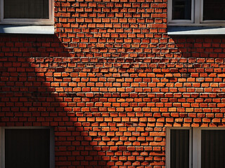 Light ray falling on vintage bricked building architecture