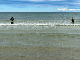 Fishing for garfish on a rod in the Baltic Sea, Mrzezyno region in Poland