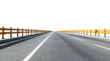 Straight road perspective with yellow barriers and clear sky at horizon.