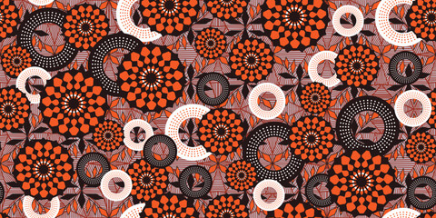 African geometric ethnic traditional orange pattern. seamless beautiful Kitenge, chitenge, Ankara style. fashion design. Geometric floral abstract motif. Floral Ankara prints, African wax prints