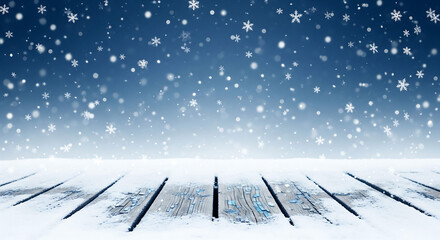 A winter scene showcases a blue backdrop with gently falling snow and a rustic wooden deck blanketed with pristine white flakes, evoking a sense of peace and holiday charm.