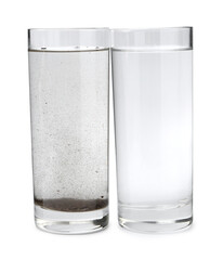 Glasses with clean and dirty water isolated on white