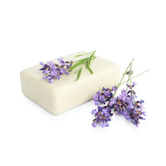 Soap bar and lavender flowers isolated on white