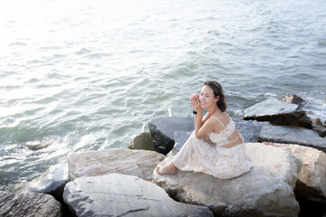 young woman relaxing on the beach