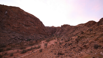 Sunset over an arid canyon