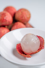 Fresh lychee and peeled lychee pulp