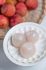 Fresh lychee and peeled lychee pulp