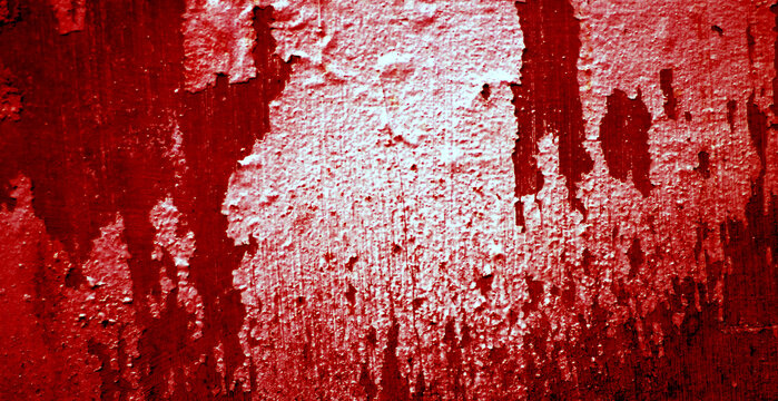 Cracked red background, scary bloody wall. white wall with blood splatter for halloween background. Horror background