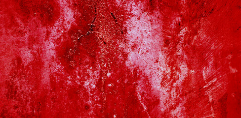 Cracked red background, scary bloody wall. white wall with blood splatter for halloween background. Horror background