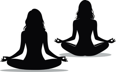Two silhouetted women meditating in lotus pose with gyan mudra
