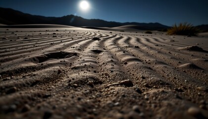 a barren desert landscape under a clear sky