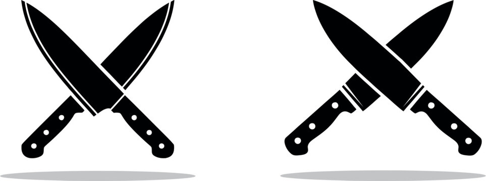 Two black chef knives crossed silhouette with shadows on white background