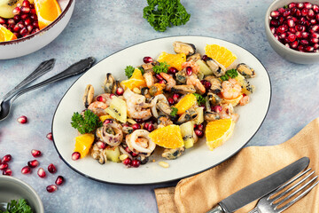 Spicy seafood salad with fruits.