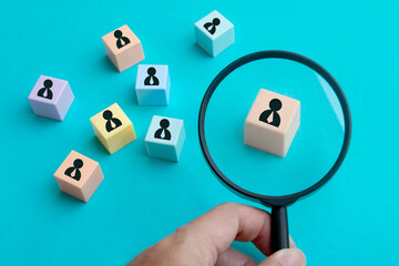 Job hiring and employment concept; Magnifying glass choose right person; Human resource and recruitment