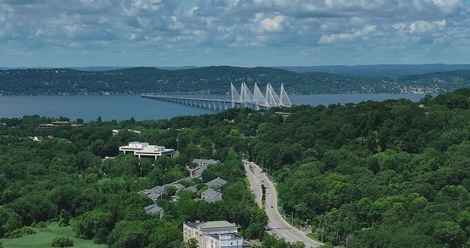 Elmsford, NY, US - July 9, 2025.  Afternoon aerial video over the Elmsford, NY, local commercial buildings and Interstate 87 and 287
