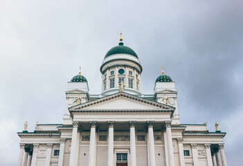 protestant cathedral in helsinki with white simple facade with finish north architecture 