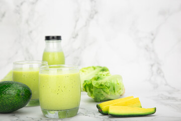 fresh avocado smoothie paired with green cos salad, served in a clean healthy beverage refreshing and nutritious plant based drink with care and balance.