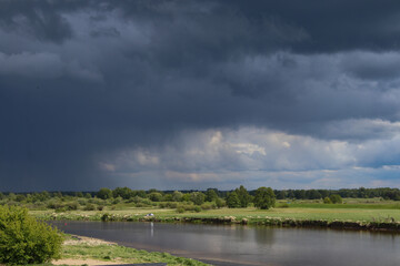 Brok, dark storm clouds over the Bug River, Masovian Voivodeship, Poland