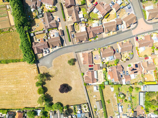 UAV top down view of drought conditions due to an extreme summer in 2025. Lawns and public space grass areas are parched.
