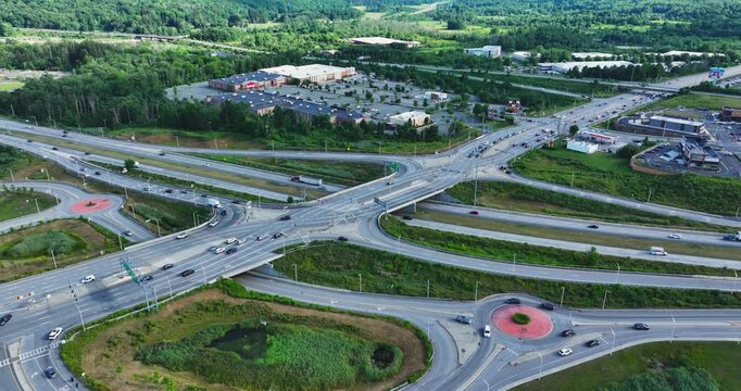 Aerial, drone, afternoon video of a diverging diamond interchange (DDI), located in Woodbury, NY