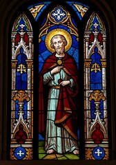 Stained glass window depicting Saint Martin sharing his cloak  