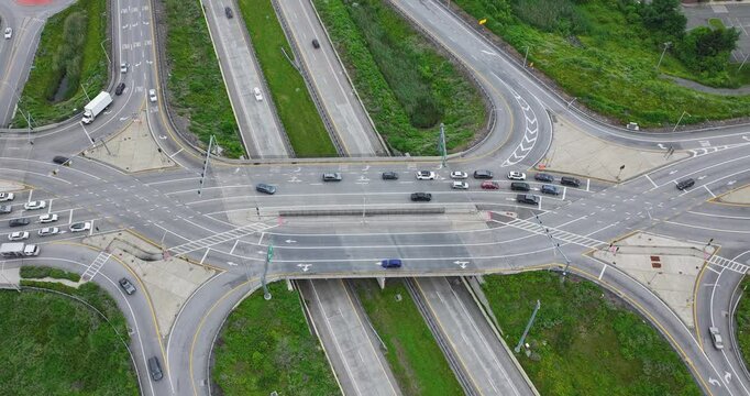 Hyper lapse aerial, drone, afternoon video of a diverging diamond interchange (DDI), located in Woodbury, NY