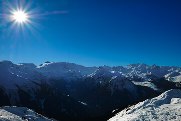Panoramic view of mountains and blue sky on a sunny day