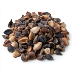 Obraz premium A pile of dried black garlic cloves with varied textures and colors isolated on white background