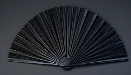 Elegantly crafted black folding fan, closed, smooth surface, intricate details, background, still life