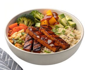 Delicious full BBQ Tempeh Bowl with vegetables and grains on white background in real food photography