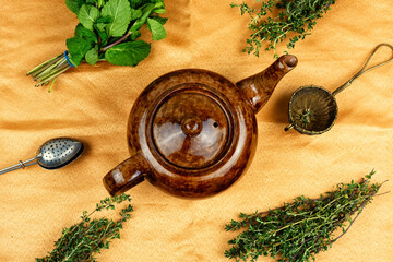 Glass teapot with herbal tea.
