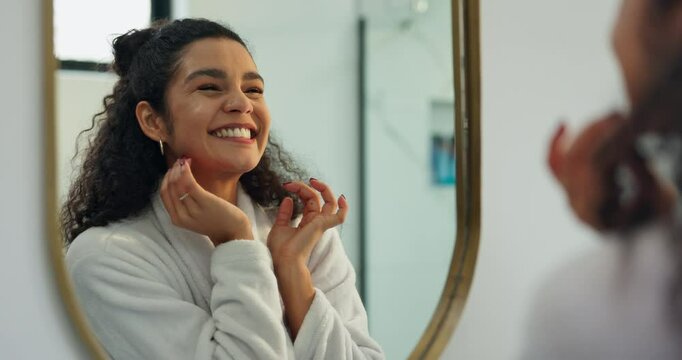 Happy woman, reflection and beauty with mirror in bathroom for skincare, self care or love in home. Female person, satisfaction and blowing kiss with smile for grooming, hygiene or facial in house