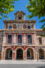 Barcelona, Spain-April 21, 2025. Facade of the Parliament of Catalonia in Ciutadella Park, Barcelona, Spain showcasing neoclassical architecture on a bright summer day.