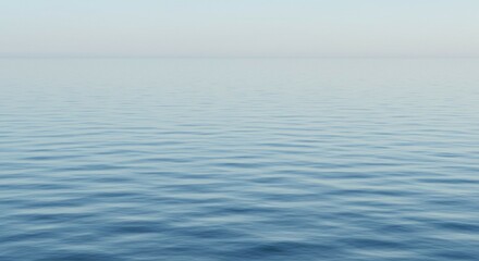 Obraz premium Calm Ocean Water with Gentle Waves and Soft Sky
