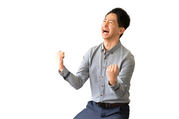 ガッツポーズで喜ぶ男性ビジネスマン