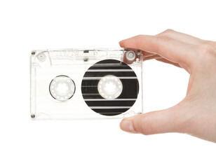 Woman with audio cassette on white background, closeup