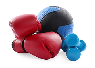 Medicine ball, dumbbells and boxing gloves isolated on white