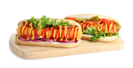 Tasty hot dogs with vegetables, mustard and ketchup isolated on white