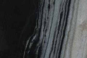 Texture of black marble surface as background, top view
