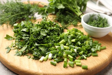 Different fresh herbs on table, closeup view