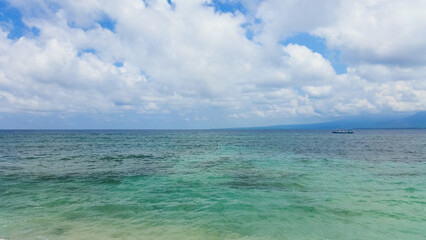 a beautiful ship is sailing in the blue sea