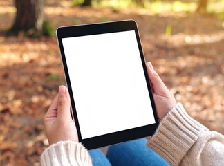 blank iPad tablet mockup, woman sitting in the woods in autumn