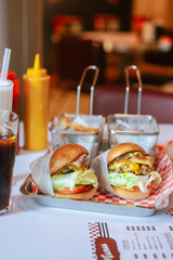Classic Diner Cheeseburgers with Fries and Drinks